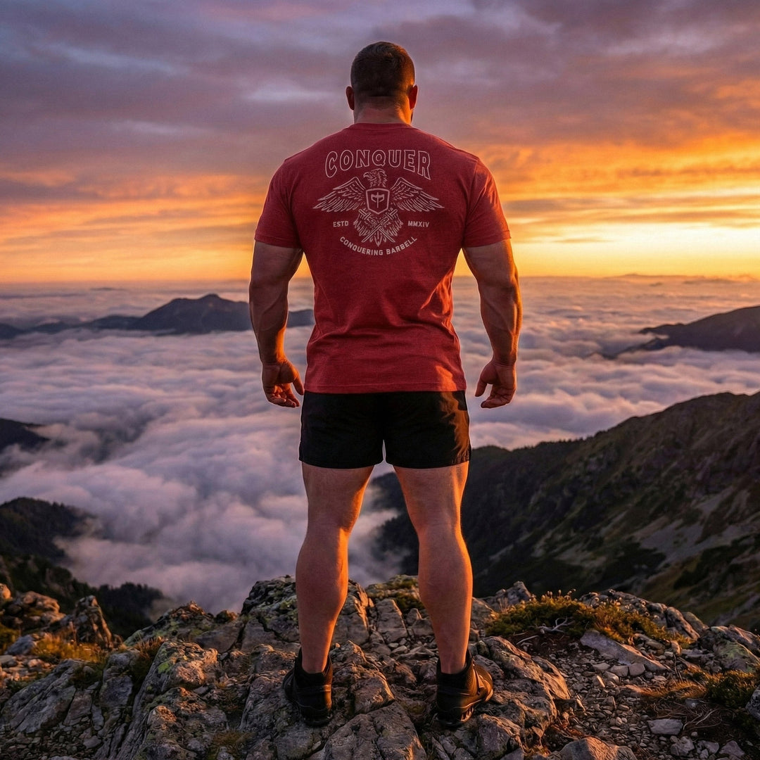 Talons Out tee in Red: an eagle with spread wings and the CB shield crest over crossed barbells