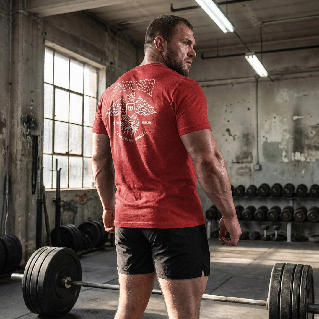 Talons Out tee in Red: an eagle with spread wings and the CB shield crest over crossed barbells