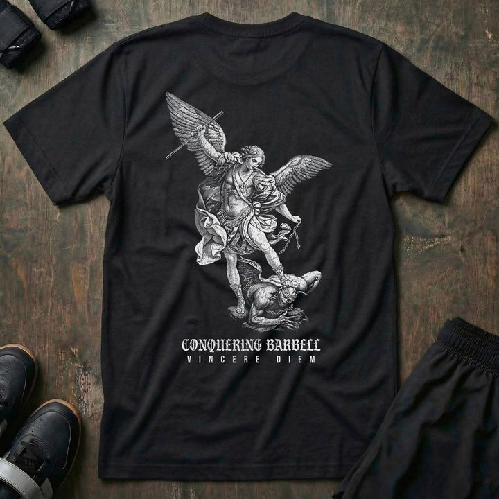 Win the Day Angel vs Dem tee in Black: a winged guardian driving his weapon down on a demon in a classic engraving style