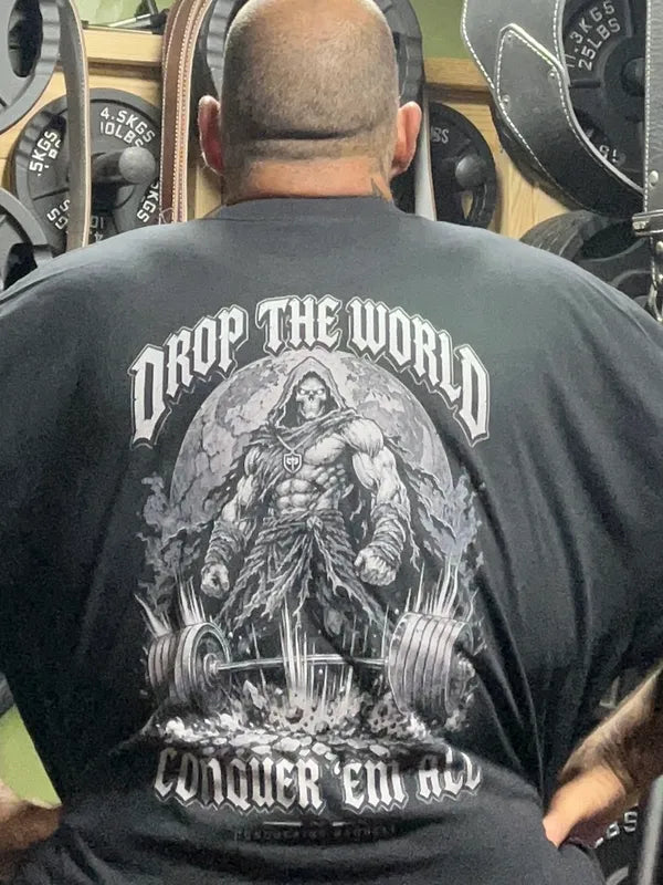 Bear wearing the Drop the World relaxed fit tee in 4XL, back print