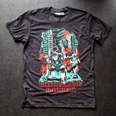 Attack of The Gainzilla - on Black Tee - Conquering Barbell