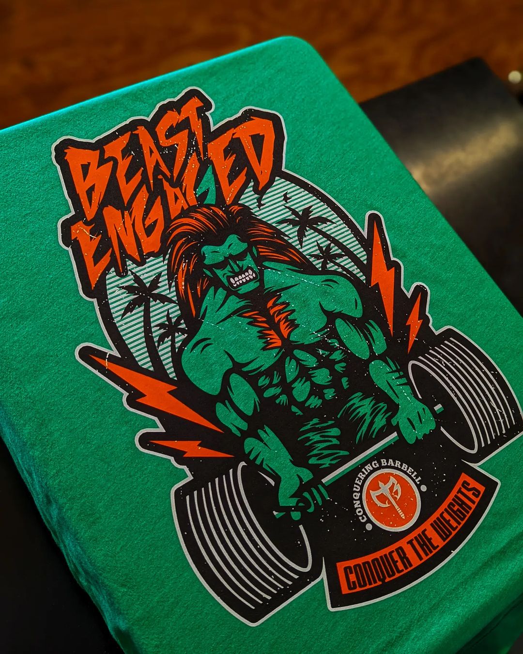 Beast Engaged tee in Kelly Green: a green-skinned beast with wild orange hair crackling with lightning