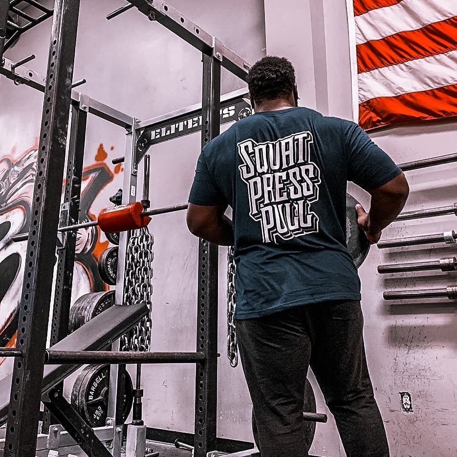 CB Iconic Squat Press Pull® tee in Navy: SQUAT PRESS PULL stacked in bold white block letters across the back