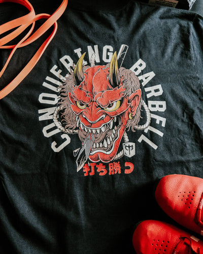 Conquer your Demon - Black Tee - Conquering Barbell