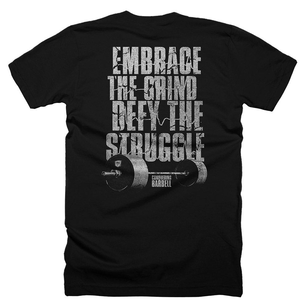 Embrace the Grind, Defy the Struggle - on Black Tee - Conquering Barbell