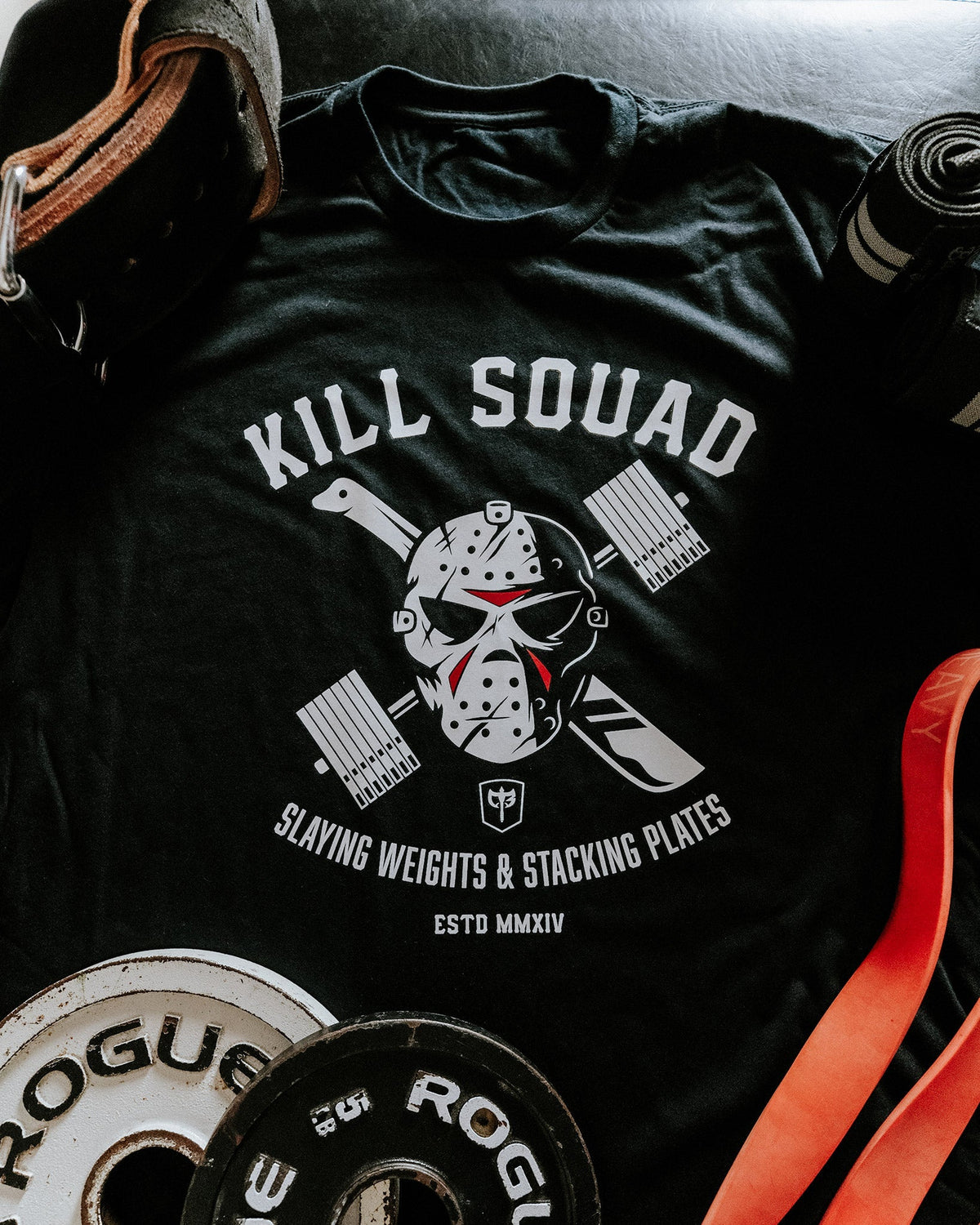 Kill Squad tee in Black: a skull in a hockey mask over crossed loaded barbells and machetes