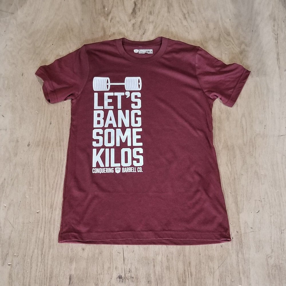 Let's Bang Some Kilos - on Heather Cardinal Tee - Conquering Barbell