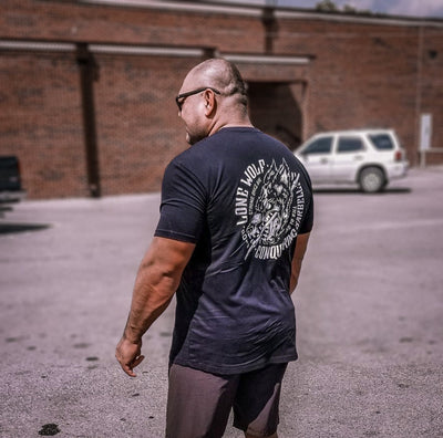 Lone Wolf - on Black Tee - Conquering Barbell